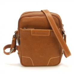 Modèle de sac holster en cuir de vachette pleine fleur pour homme de  couleur cognac.